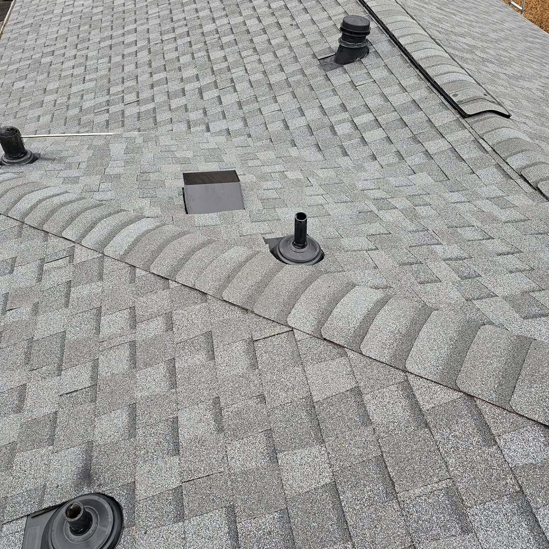 Close view of clean roof flashing and vent details