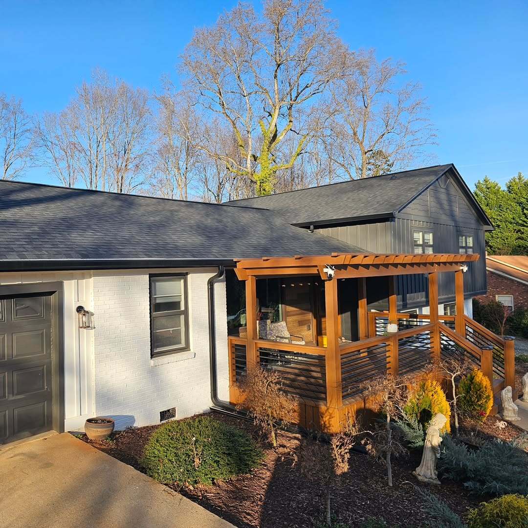 Finished North Carolina home exterior with a renovated porch and roofline